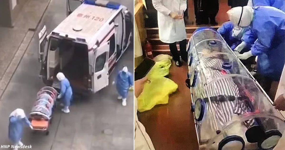 Китайски лекари в костюми за химическа защита транспортират пациент с